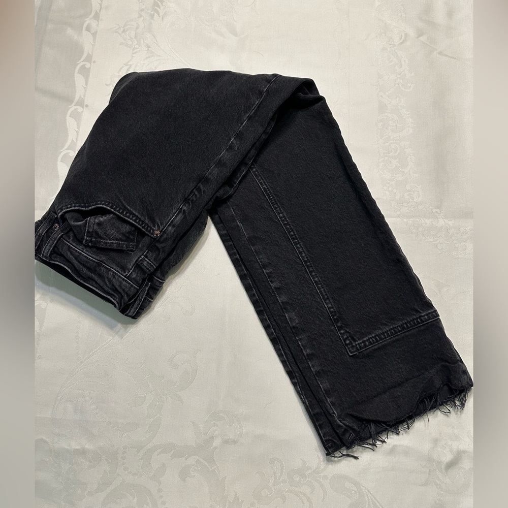 Free People Risk Taker Mid-Rise Jeans in black.